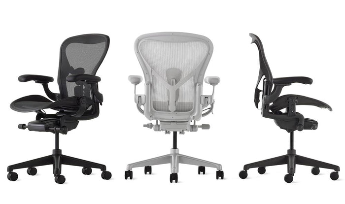 Three Aeron office chairs in mineral, graphite and carbon