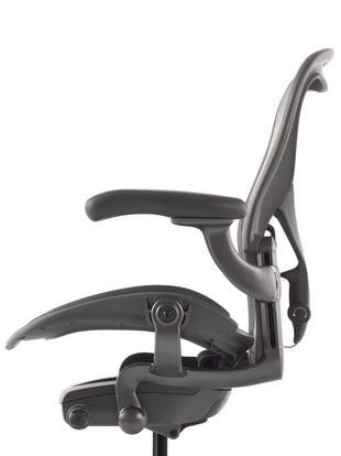 Close-up view of the castors on an Aeron office chair